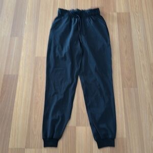 Lululemon stretch high rise Jogger size 4. Black. Perfect condition.